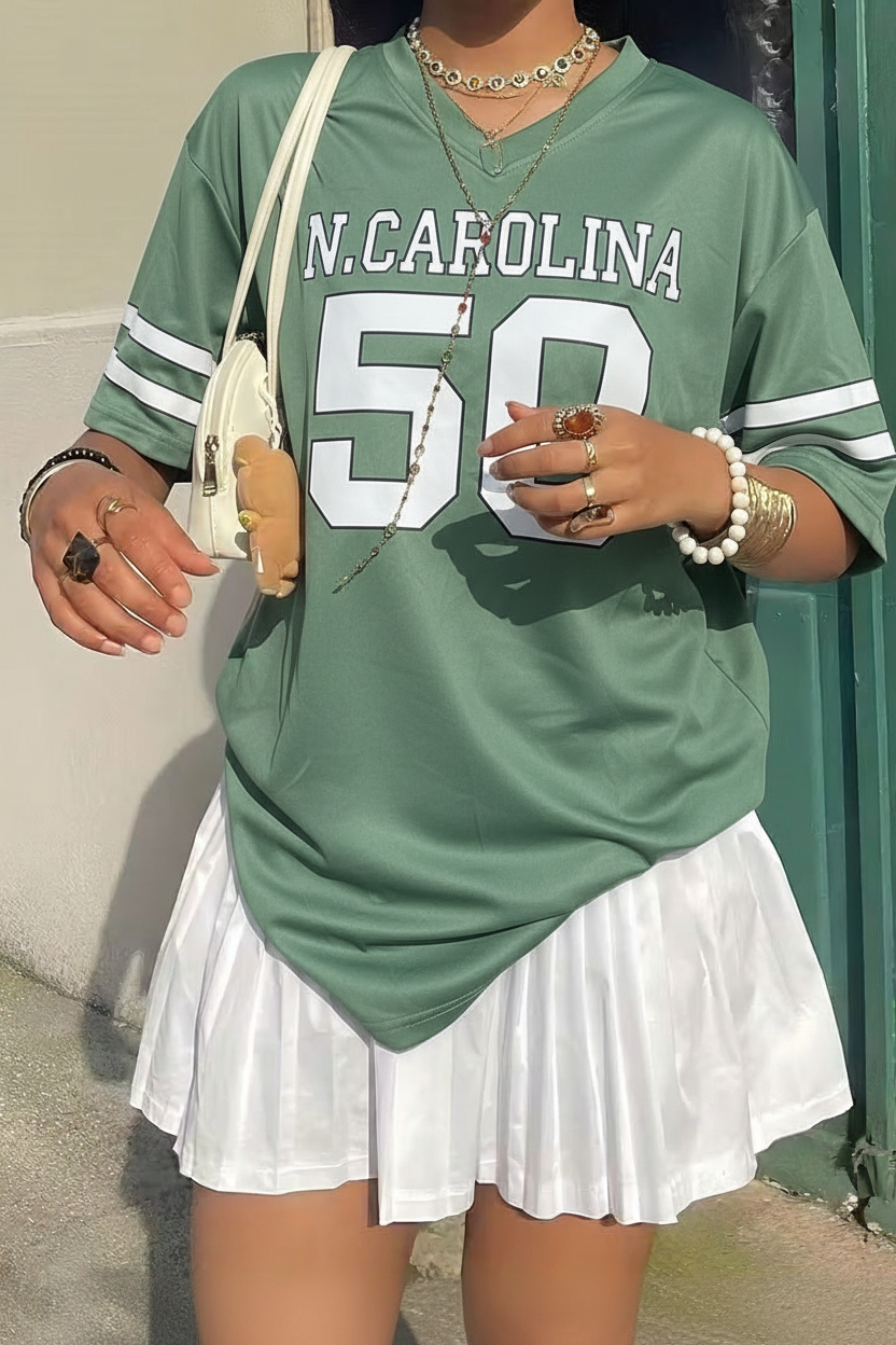 Modelo con suéter verde N.Carolina